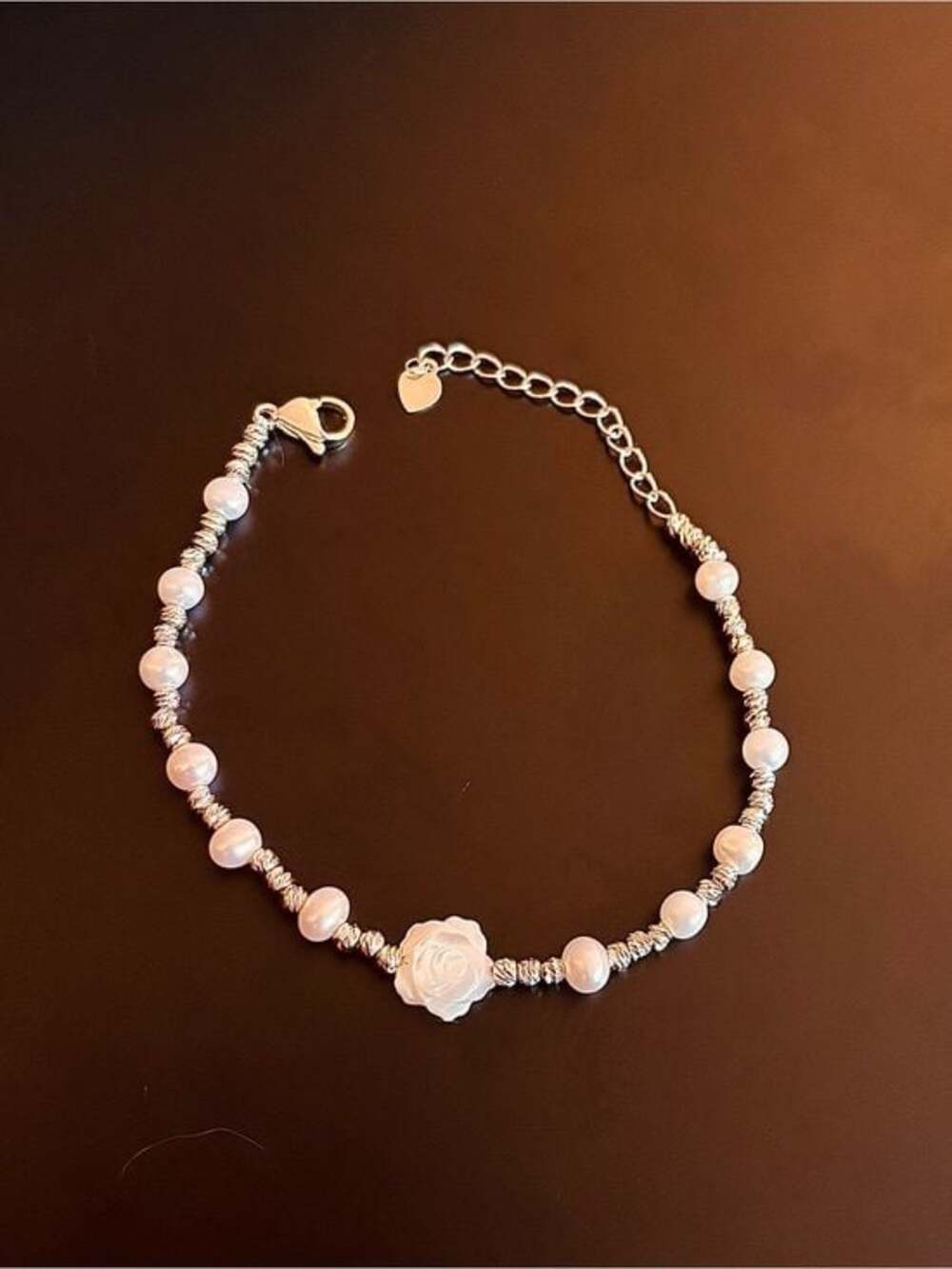 Delicate White Pearl Bracelet with Carved Rose Center
